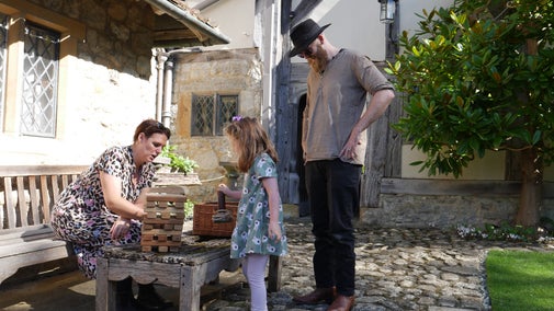 Family games in the courtyard at Stoneacre